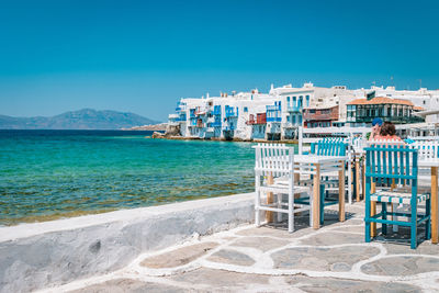 Scenic view of sea against clear blue sky