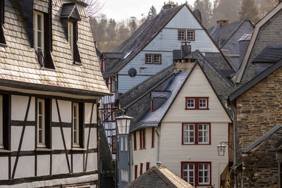 City view of monschau, germany with house facades in different materials