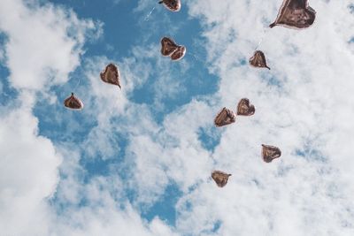 Low angle view of rocks against sky