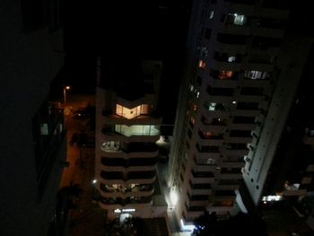 Illuminated buildings in city at night