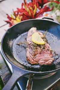 High angle view of meat in cooking pan