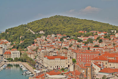 High angle view of townscape and buildings against sky