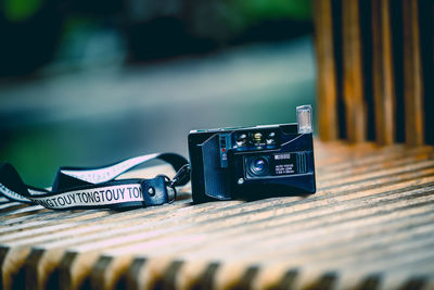 Close-up of camera on table