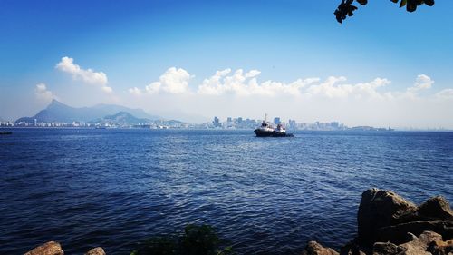 Boat sailing in sea