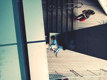 High angle view of people on railing