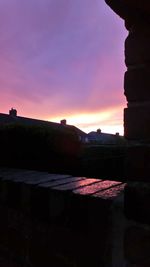 Scenic view of silhouette land against sky during sunset