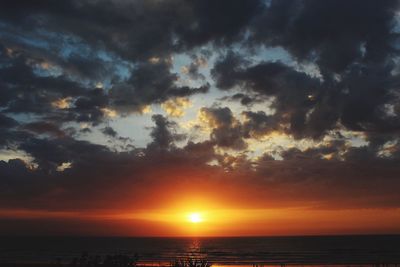 Scenic view of sea at sunset