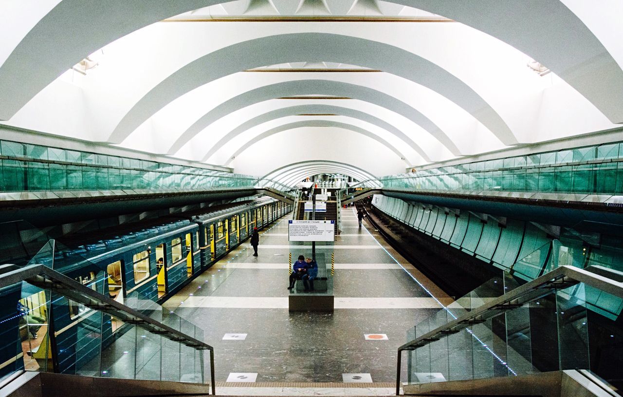 architecture, built structure, passenger, subway station, indoors, city life, modern, city, public transportation, people, subway train, real people, commuter, adults only, illuminated, large group of people, adult, day