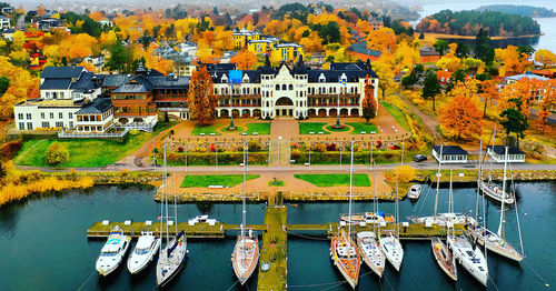 High angle view of boats in city during autumn