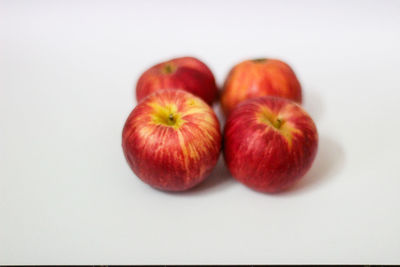 Close-up of apples on white background