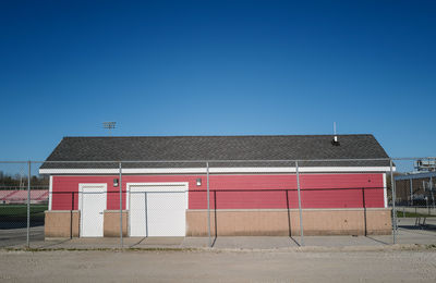 Closed red stadium storage shed