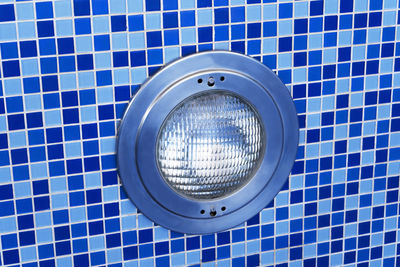 Blue swimming pool with underwater round led light. pool without water.