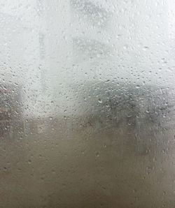 Close-up of water drops on glass