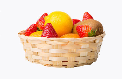 Close-up of oranges against white background