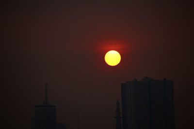 View of skyscrapers at sunset