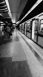 People at railroad station