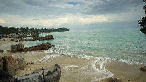 Scenic view of sea against sky in taniung pesona, bangka island, indonesia