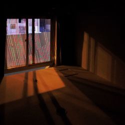 Illuminated window in dark room