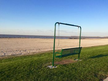 Scenic view of field against clear sky