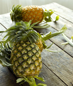 Close-up of pineapples on table