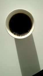 Close-up of coffee cup on table