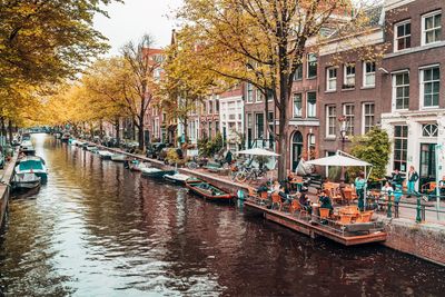 Canal amidst buildings in city