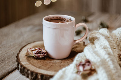 Close-up of coffee cup on table