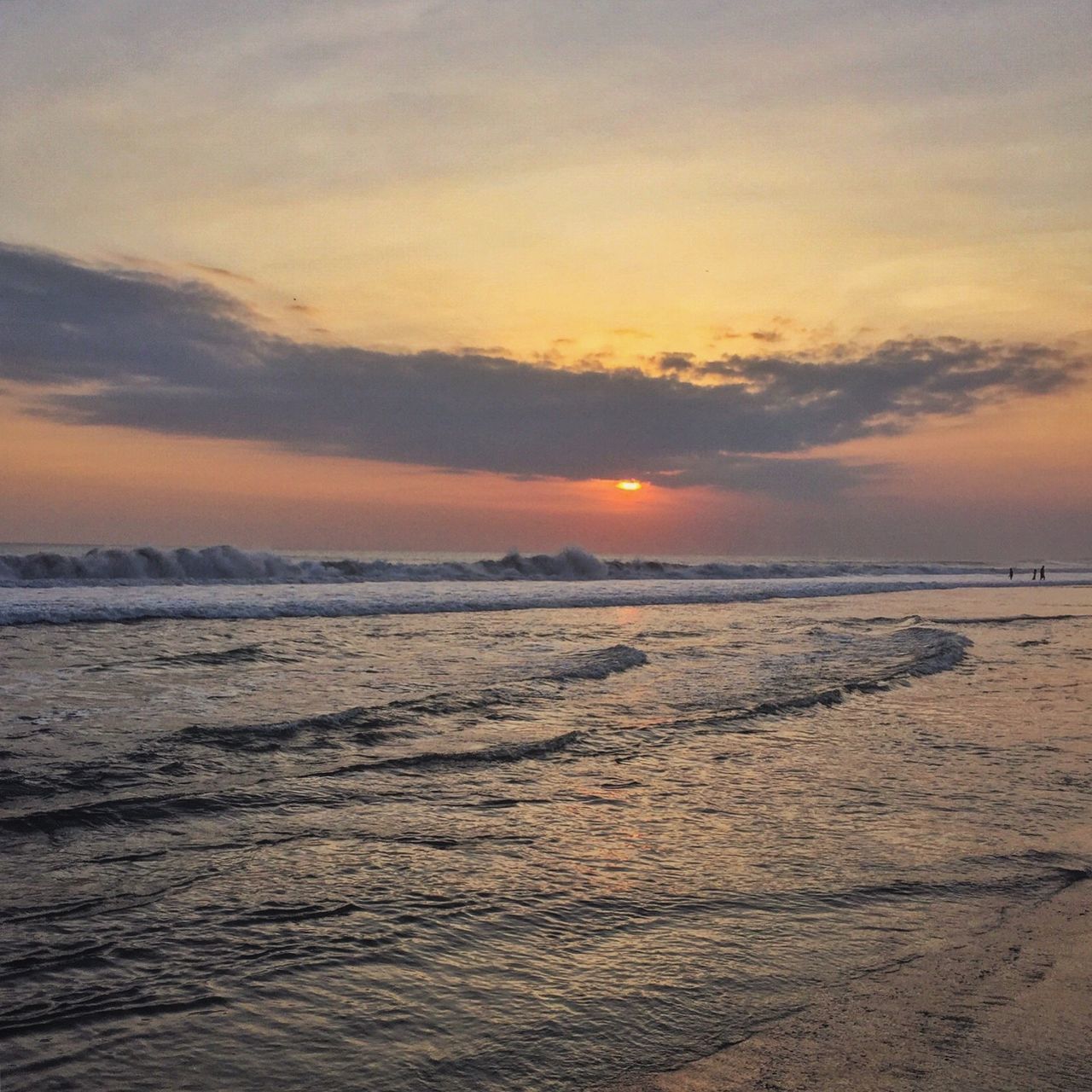 sunset, sea, scenics, water, tranquil scene, beauty in nature, sky, tranquility, beach, orange color, shore, horizon over water, nature, idyllic, cloud - sky, wave, sand, outdoors, remote, non-urban scene