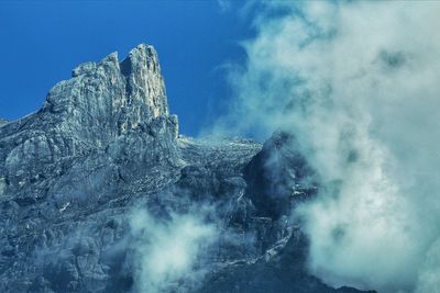 Low angle view of mt kinabalu against sky