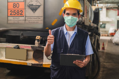 Portrait of man using mobile phone