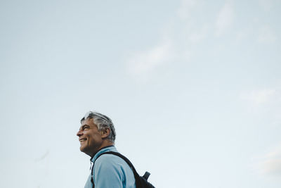 Smiling man looking away