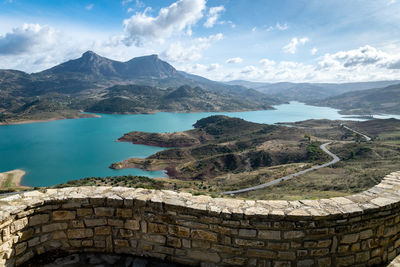 The valleys of zahara de la sierra from behind a twisted wall