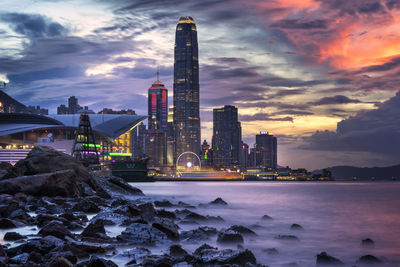 Modern buildings during sunset at victoria harbour