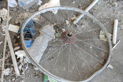 Broken glass wheel seen through hole