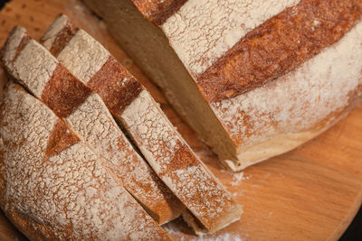 High angle view of bread on cutting board