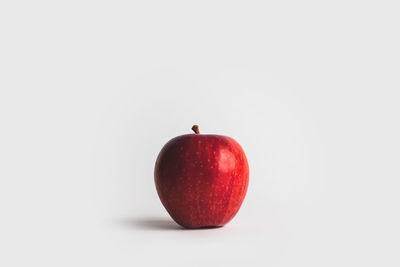 Close-up of apple against white background