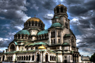Low angle view of cathedral against cloudy sky