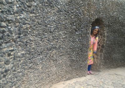 Girl standing outdoors