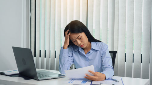 Businesswoman working at office