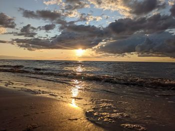 Scenic view of sea against sky during sunset