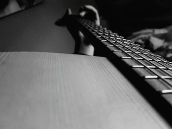 Close-up of guitar on table