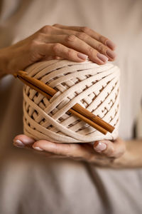 Midsection of woman holding gift box