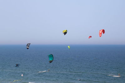 Parachutes over sea