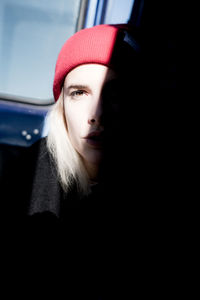 Close-up of beautiful woman in car