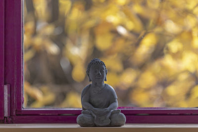 Close-up of statue against temple