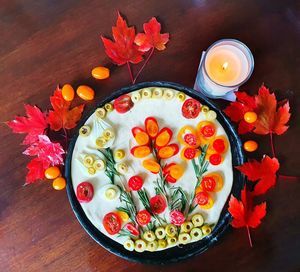 High angle view of orange fruits on table