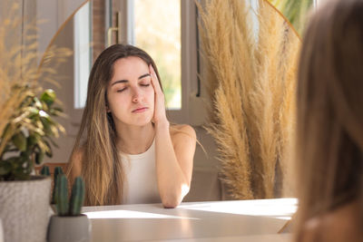 Young woman using mobile phone