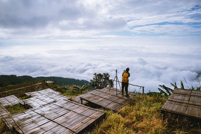 High angle view of man standing on roof