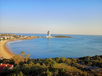 Scenic view of sea against clear blue sky