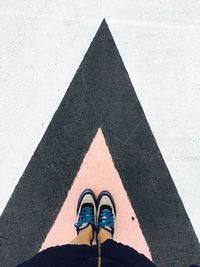 Low section of person standing on floor